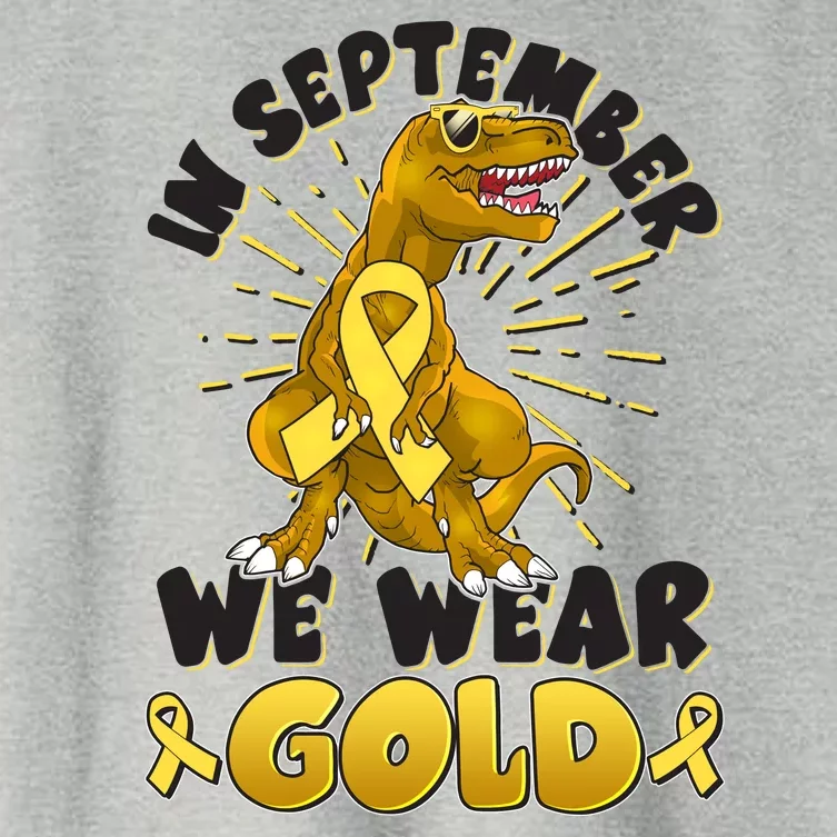 In September We Wear Gold Trex Dinosaur Childhood Cancer Awareness Women's Crop Top Tee