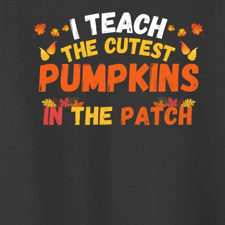 I Teach The Cutest Pumpkins Teacher Halloween Cute Jackolantern Teach Cutest Toddler T-Shirt