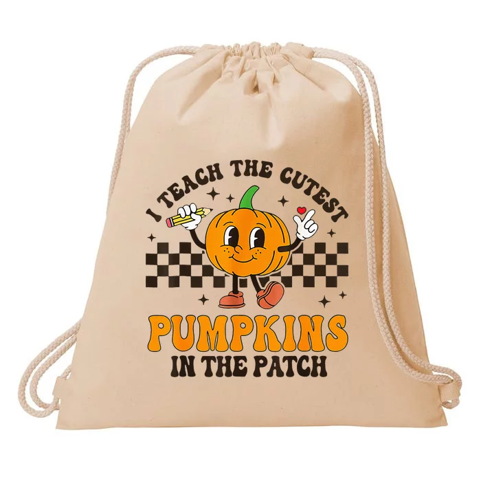 I Teach The Cutest Pumpkins In The Patch Groovy Teacher Fall Drawstring Bag