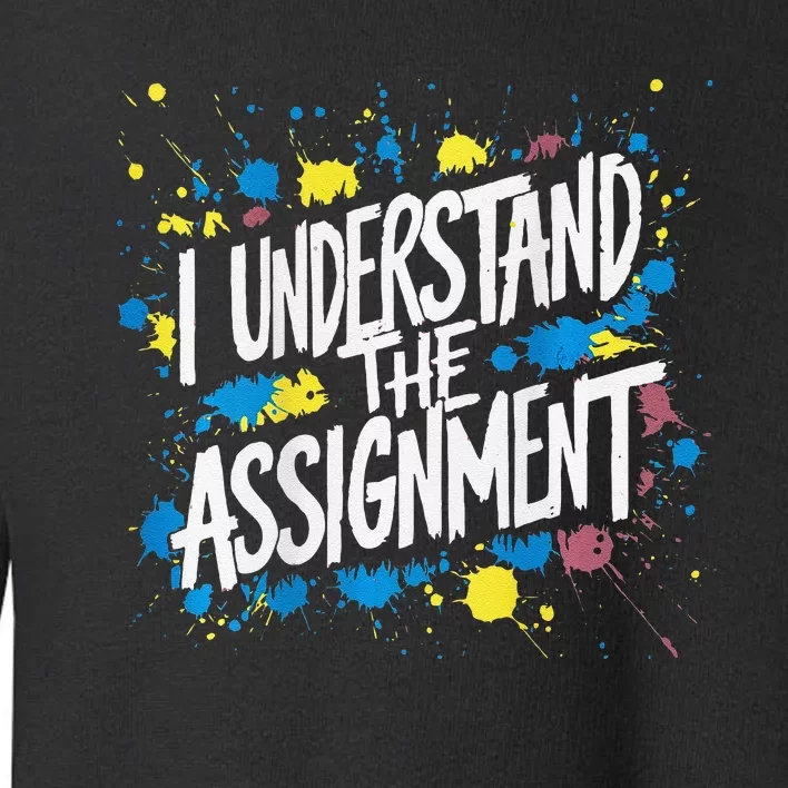 I Understand The Assignment Kamala Harris Walz On Back Print Toddler Sweatshirt