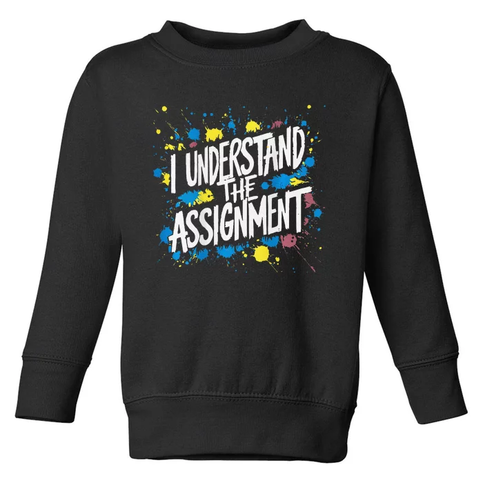 I Understand The Assignment Kamala Harris Walz On Back Print Toddler Sweatshirt