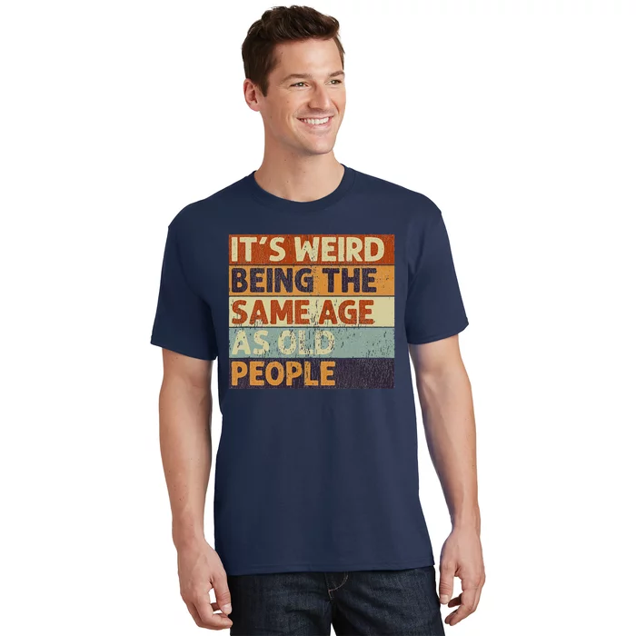 https://images3.teeshirtpalace.com/images/productImages/iwb4336199-its-weird-being-the-same-age-as-old-people--navy-at-front.webp?width=700