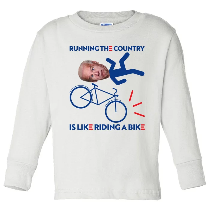 Joe Biden Falling Off Bike, Running The Country Is Like Riding A Bike Toddler Long Sleeve Shirt