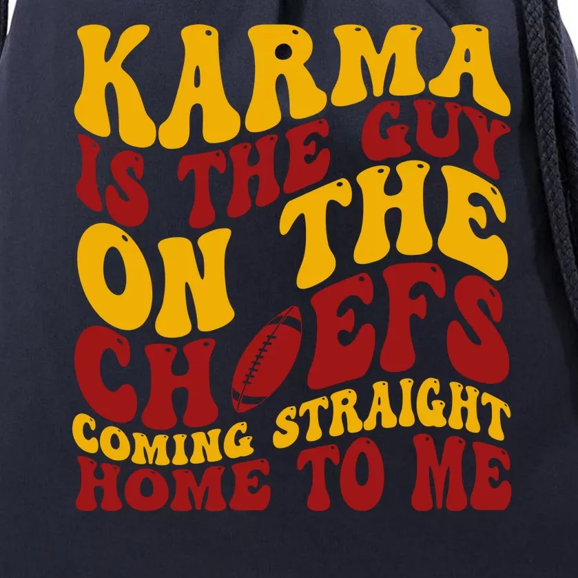 Karma Is The Guy Coming Straight Home To Me Football Drawstring Bag