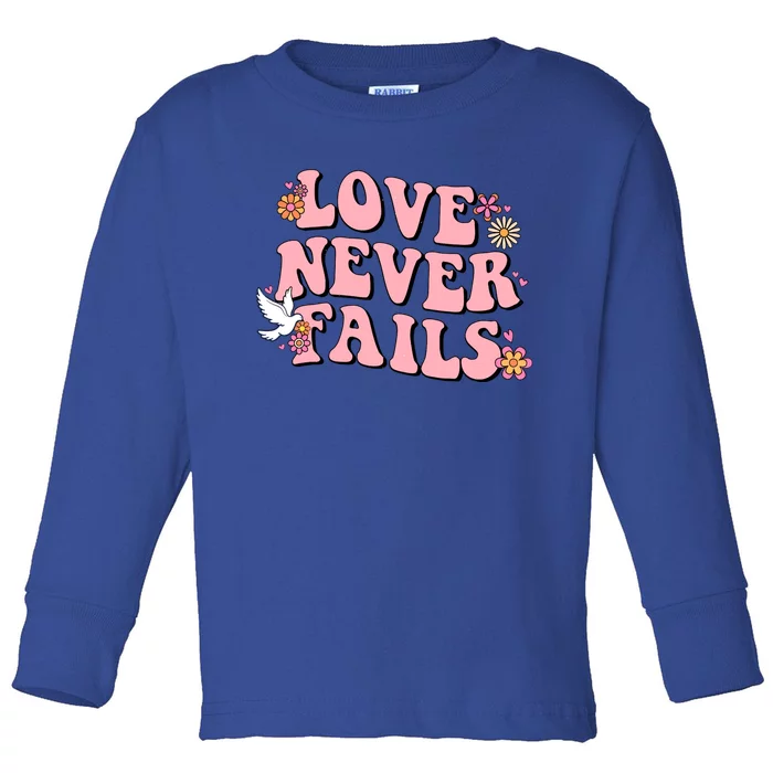 Love Never Fails Groovy Valentines Day Christian Religious Cool Gift Toddler Long Sleeve Shirt