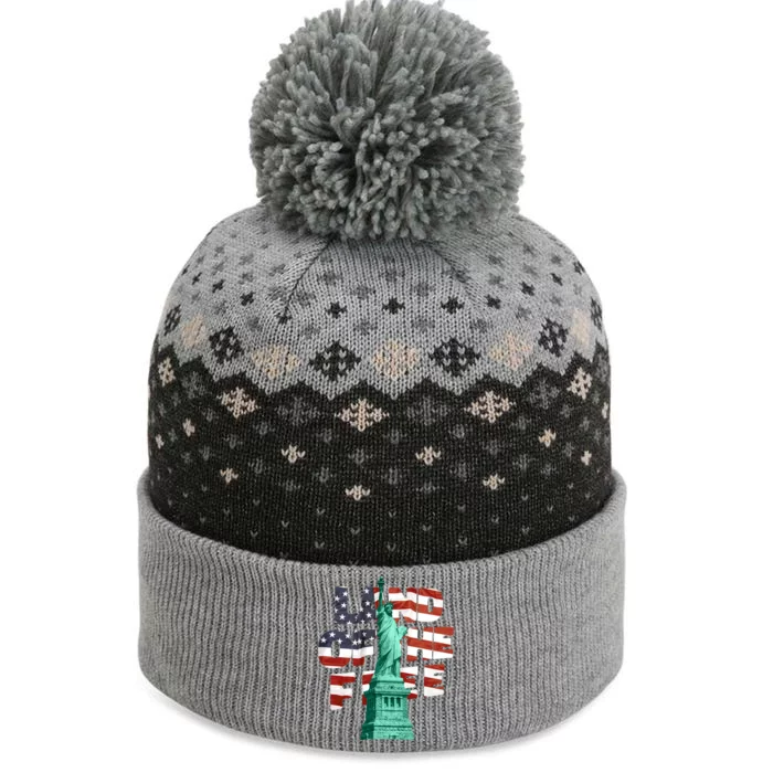 Land Of The Free Statue Of Liberty American Flag The Baniff Cuffed Pom Beanie