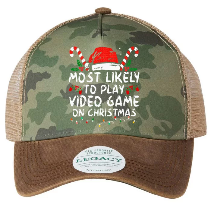 most likely to play video game on christmas santa gaming Legacy Tie Dye Trucker Hat