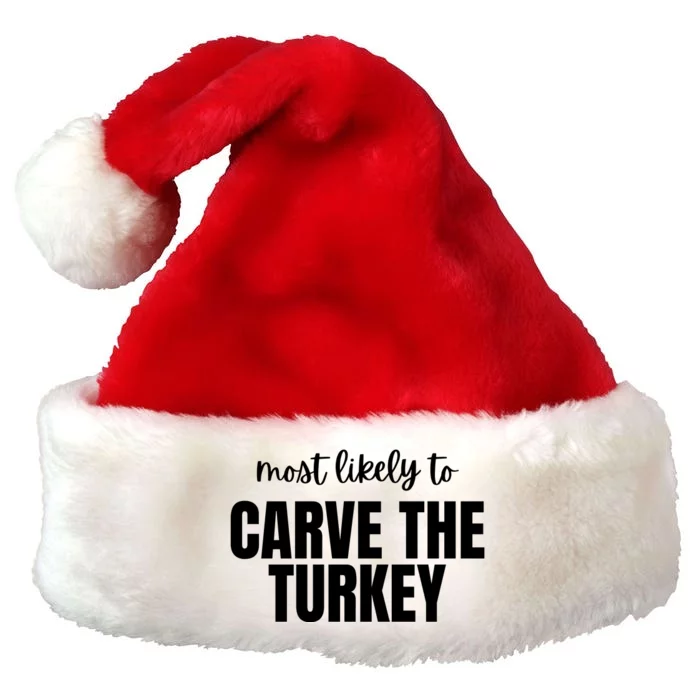 Most Likely To Carve The Turkey Premium Christmas Santa Hat