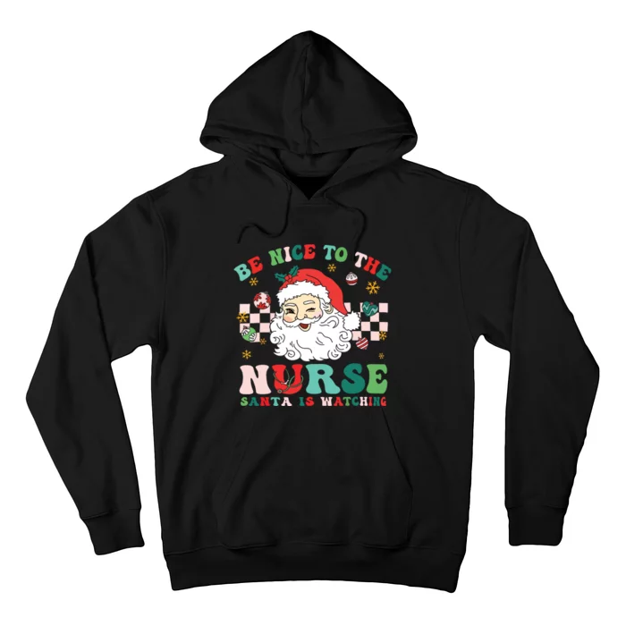 Nurse Christmas Shirts Be Nice To The Nurse Santa Is Watching Hoodie