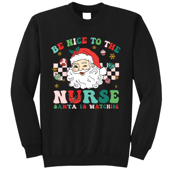 Nurse Christmas Shirts Be Nice To The Nurse Santa Is Watching Tall Sweatshirt