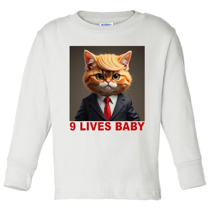 Nine Lives Baby Cat In Suite With Trump Hair Funny Toddler Long Sleeve Shirt