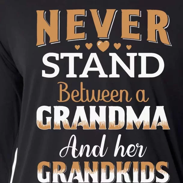 Never Stand Between A Grandma And Her Grandkids Cooling Performance Long Sleeve Crew