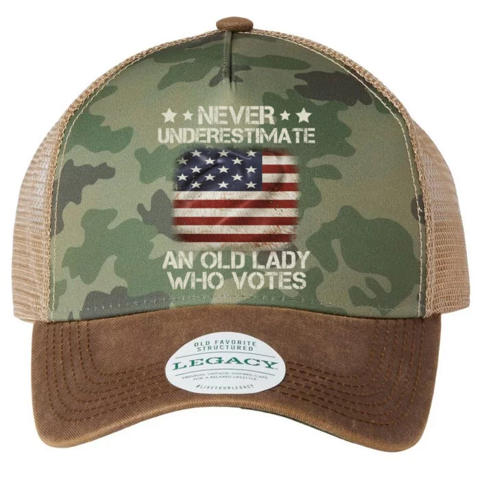 Never Underestimate An Old Lady Who Votes Usa Flag Legacy Tie Dye Trucker Hat