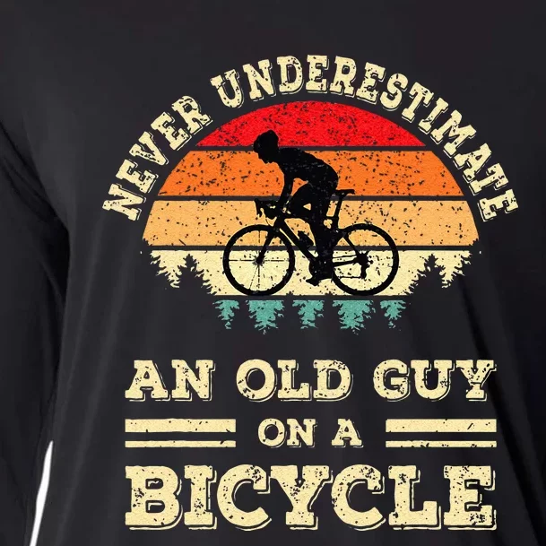 Never Underestimate An Old Guy On A Bicycle Funny Cycling Cooling Performance Long Sleeve Crew