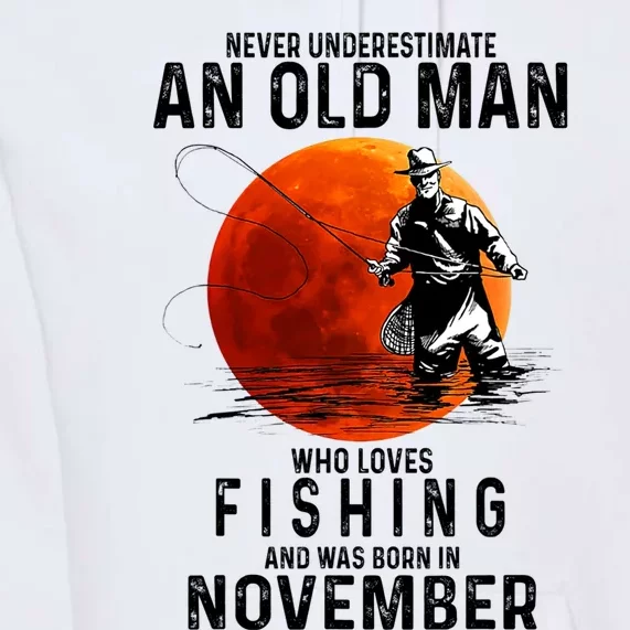 Never Underestimate An Old Man Who Loves Fishing November Premium Hoodie