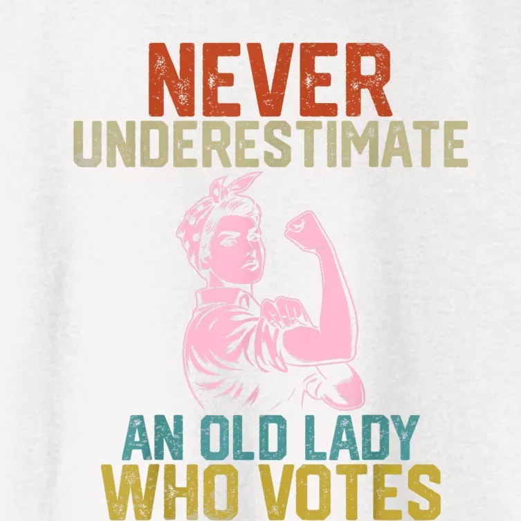 Never Underestimate An Old Lady Who Votes Feminist Elections Women's Crop Top Tee