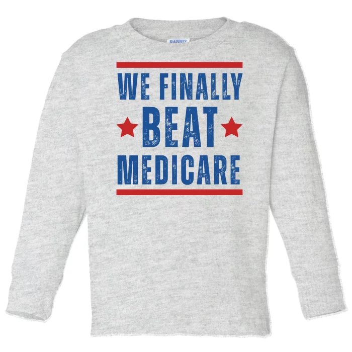 Official We Finally Beat Medicare Poltical Toddler Long Sleeve Shirt