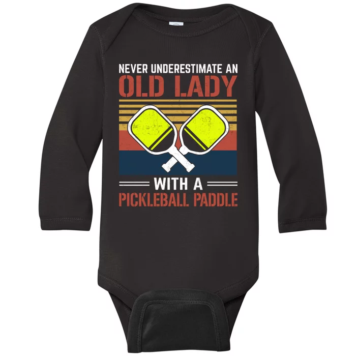 Pickleball Never Underestimate An Old Lady With A Pickleball Paddle Baby Long Sleeve Bodysuit