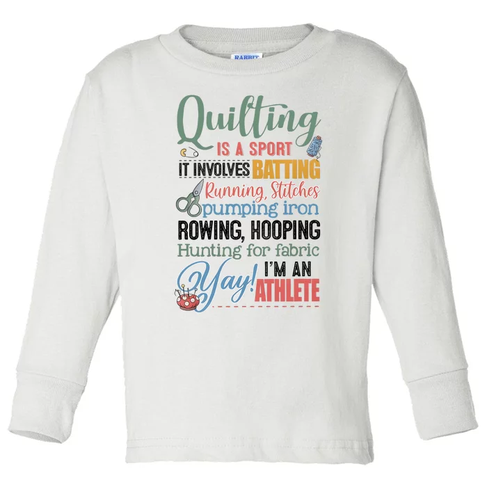 Quilting Is A Sport It Involves Batting Running Stitches Pumping Iron Toddler Long Sleeve Shirt