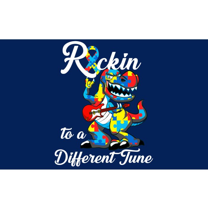 Rockin To A Different Tune Autism Dinosaur Bumper Sticker