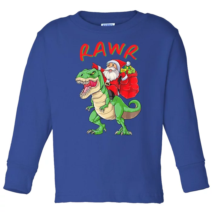 Rawr Santa Riding A Green Dinosoar Delivering Presents Meaningful Gift Toddler Long Sleeve Shirt