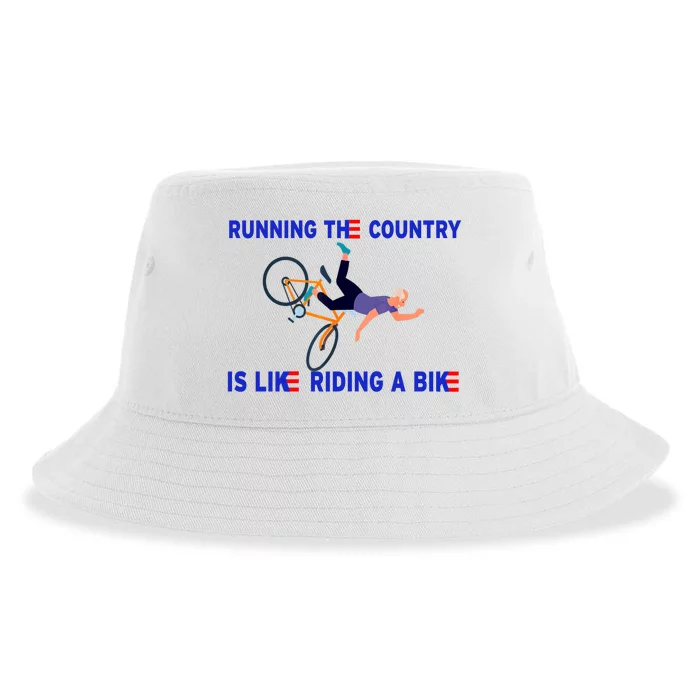 Running The Country Is Like Riding A Bike Funny Joe Biden Meme Sustainable Bucket Hat