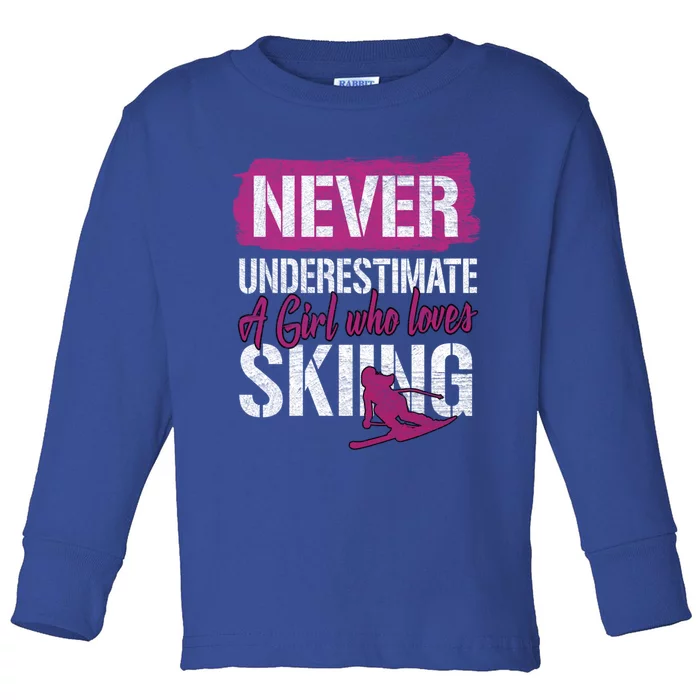 Ski Lovers Never Underestimate A Who Loves Skiing Gift Funny Gift Toddler Long Sleeve Shirt