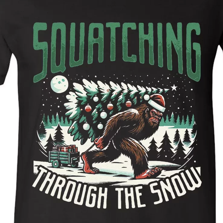 Squatching Through The Snow Bigfoot Carrying Christmas Tree V-Neck T-Shirt