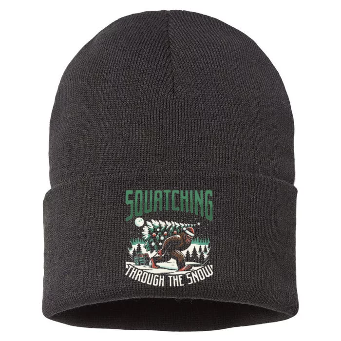 Squatching Through The Snow Bigfoot Carrying Christmas Tree Sustainable Knit Beanie