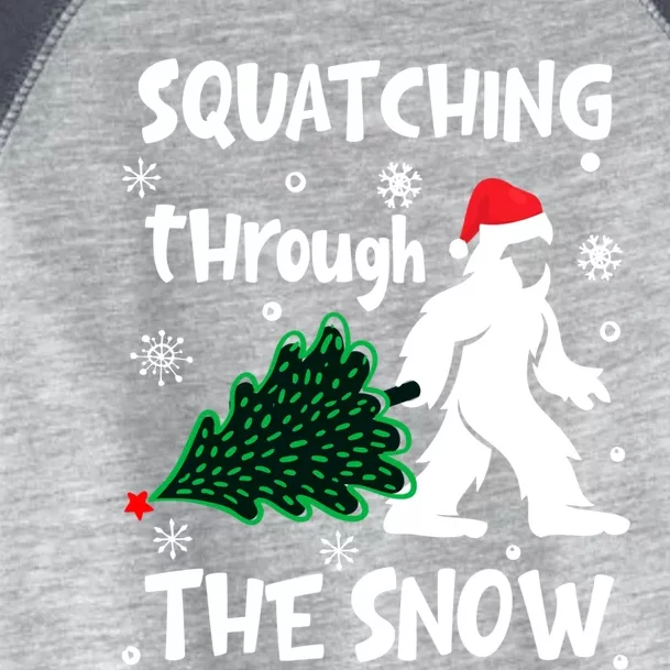 Squatching Through The Snow Christmas Sasquatch Santa Hat Toddler Fine Jersey T-Shirt