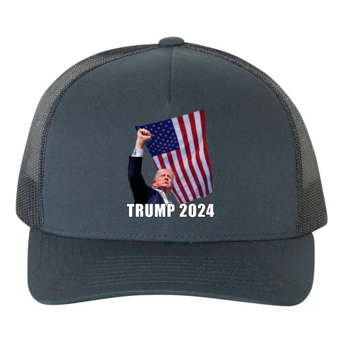 Trump 2024 Bullet Flag Fist Election Yupoong Adult 5-Panel Trucker Hat