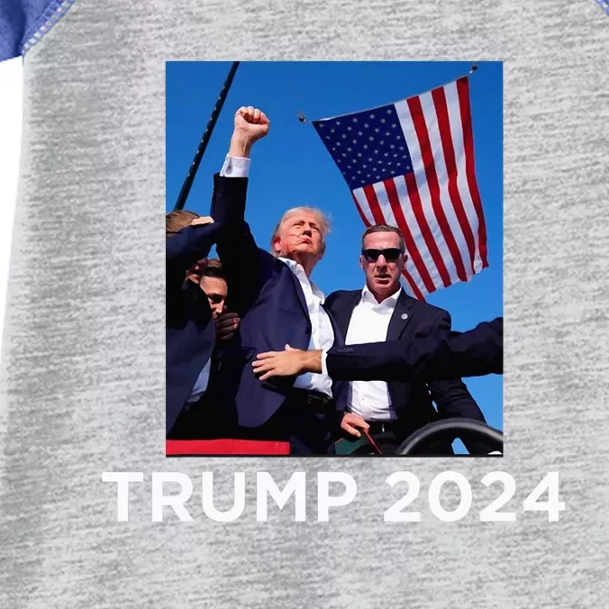 Trump 2024 Campaign Rally – Fist Pumping With American Flag Infant Baby Jersey Bodysuit