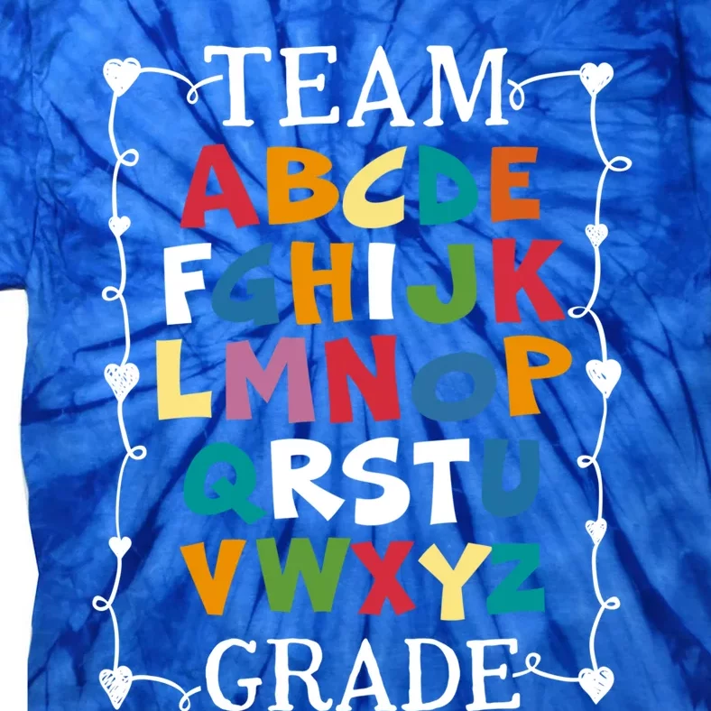 Team First Grade Back To School Alphabet Gift For Teacher Gift Tie-Dye T-Shirt