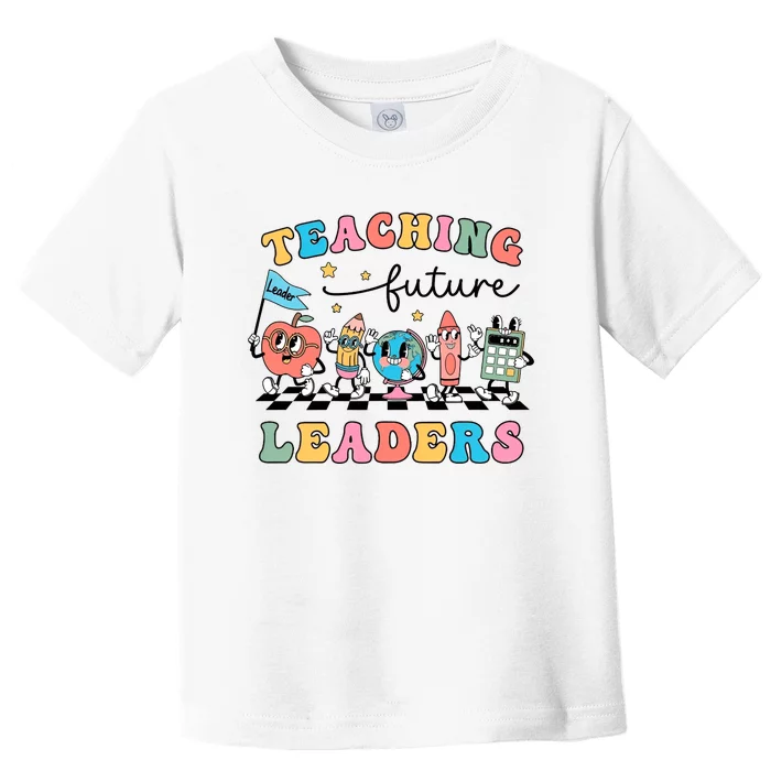 Teaching Future Leaders Back To School Kindergarten Teacher Groovy Toddler T-Shirt