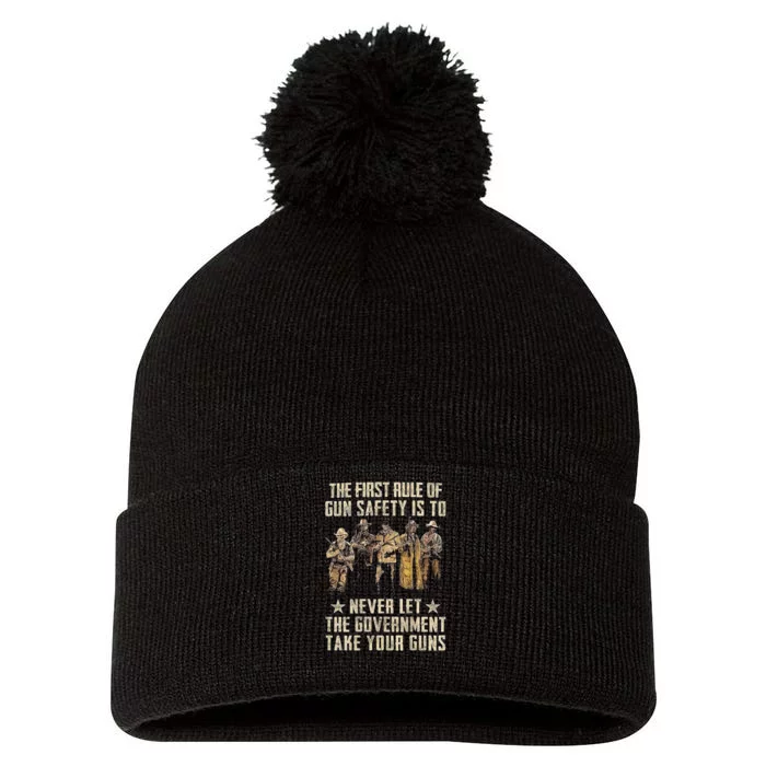 The First Rule Of Gun Safety (On Back) Pom Pom 12in Knit Beanie