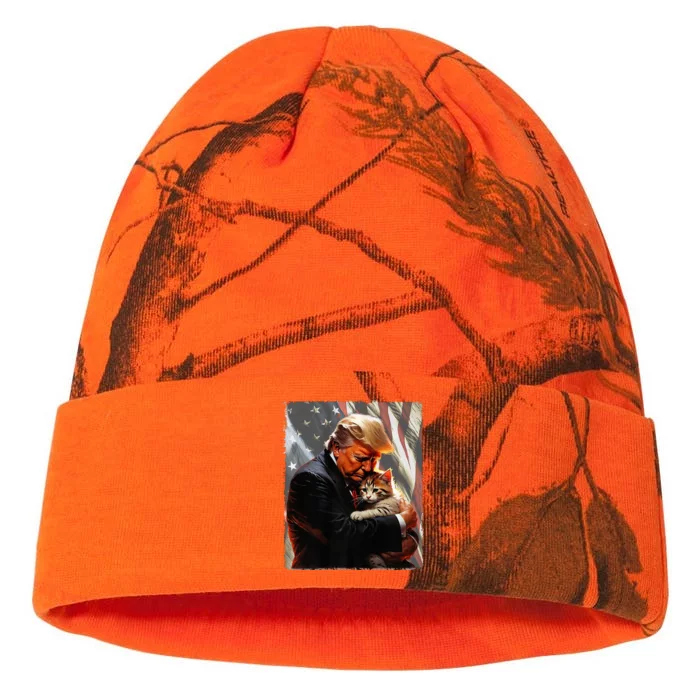 Trump Hugging An Orange Cat 2024 Make Cats Safe Again Premium Kati - 12in Camo Beanie