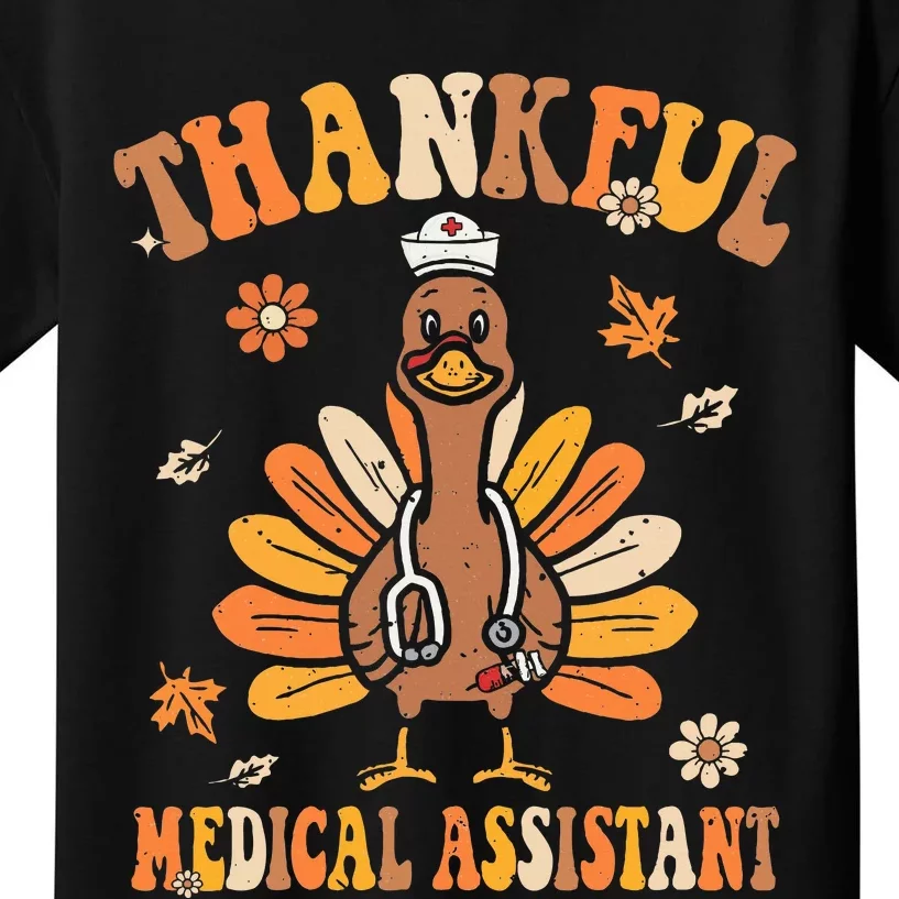 Thankful Nurse Assistant Groovy Thanksgiving Turkey Design Kids T-Shirt