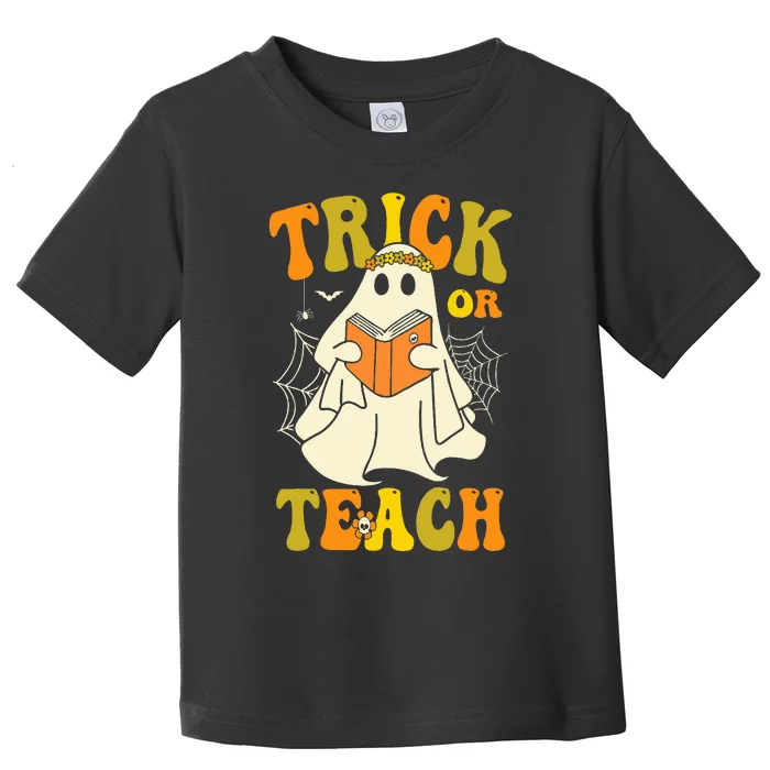 Trick or Teach Groovy Halloween Retro Floral Ghost Teacher Toddler T-Shirt