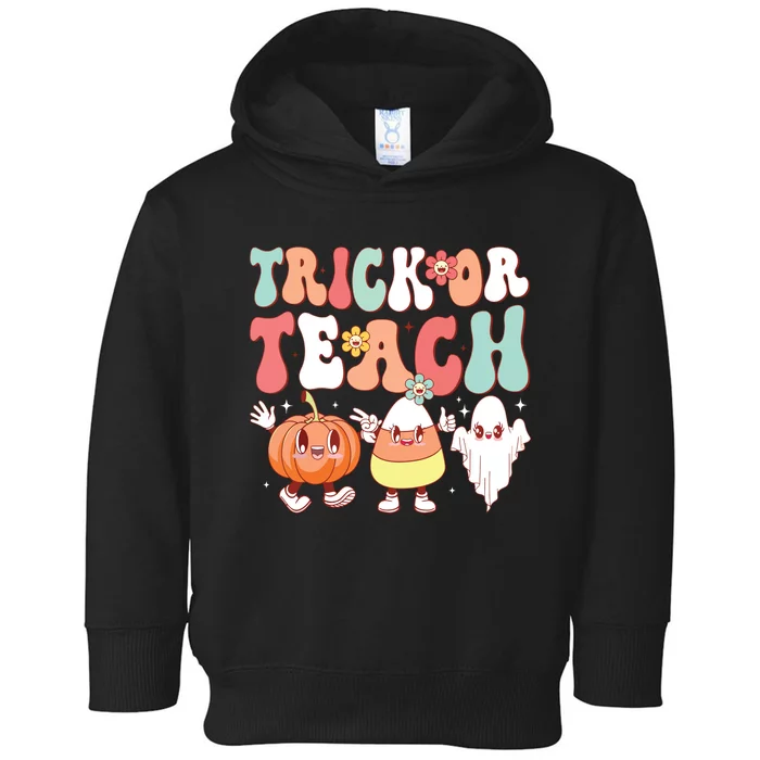 Trick Or Teach Groovy Halloween Retro Floral Ghost Teacher Toddler Hoodie