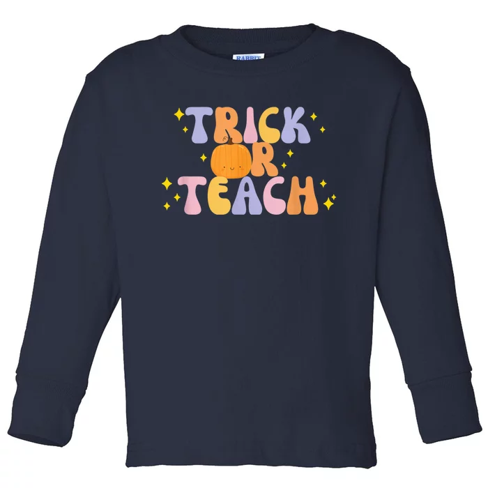 Trick or Teach Retro Groovy Halloween Cute Pumpkin Teacher Toddler Long Sleeve Shirt