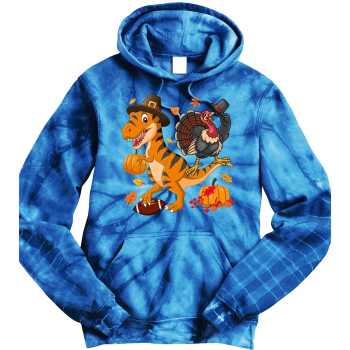 Turkey Pilgrim Riding Trex Dinosaur Thanksgiving And Football Funny Gift Tie Dye Hoodie