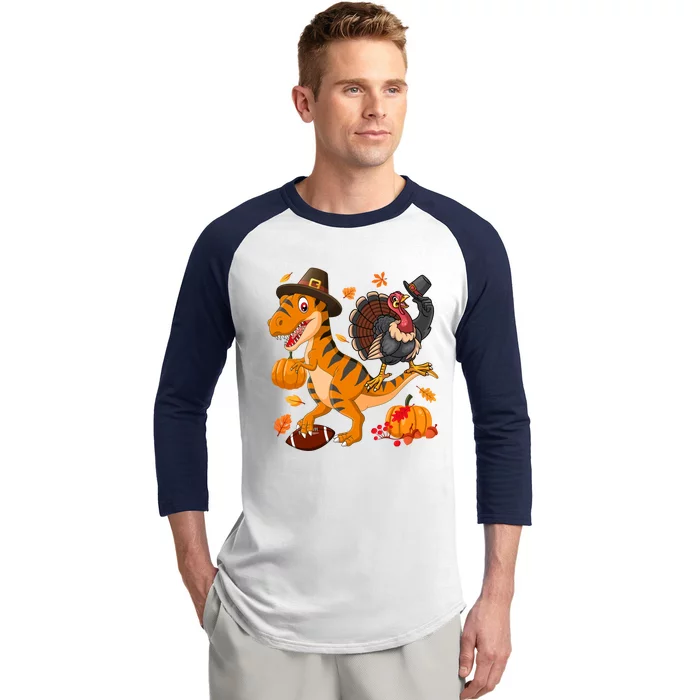 Turkey Pilgrim Riding Trex Dinosaur Thanksgiving And Football Funny Gift Baseball Sleeve Shirt