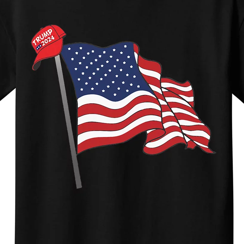 Trump Red Baseball Cap On An American Flag American Pride Kids T-Shirt