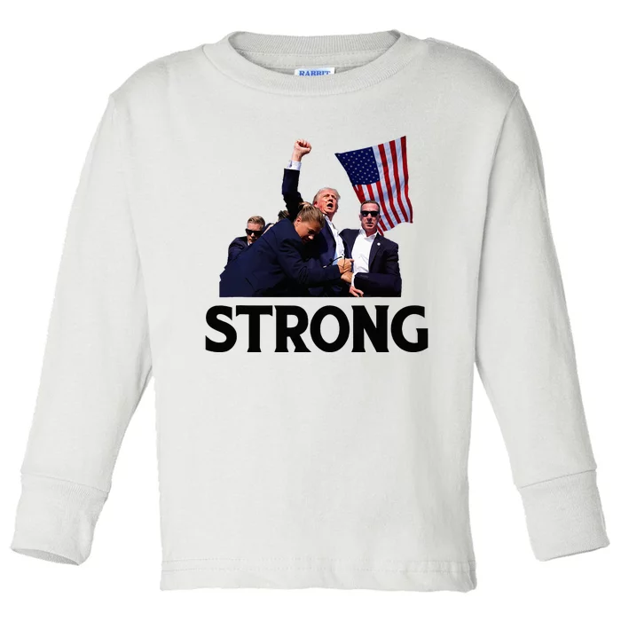 Trump Strong Fist Hand Us Vote Trump 2024 Survives Rally Toddler Long Sleeve Shirt