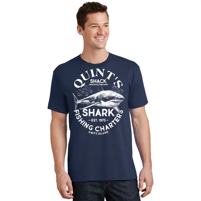https://images3.teeshirtpalace.com/images/productImages/vintage-quints-shack-shark-fishing-charters-est-1975--navy-at-front.webp?width=700