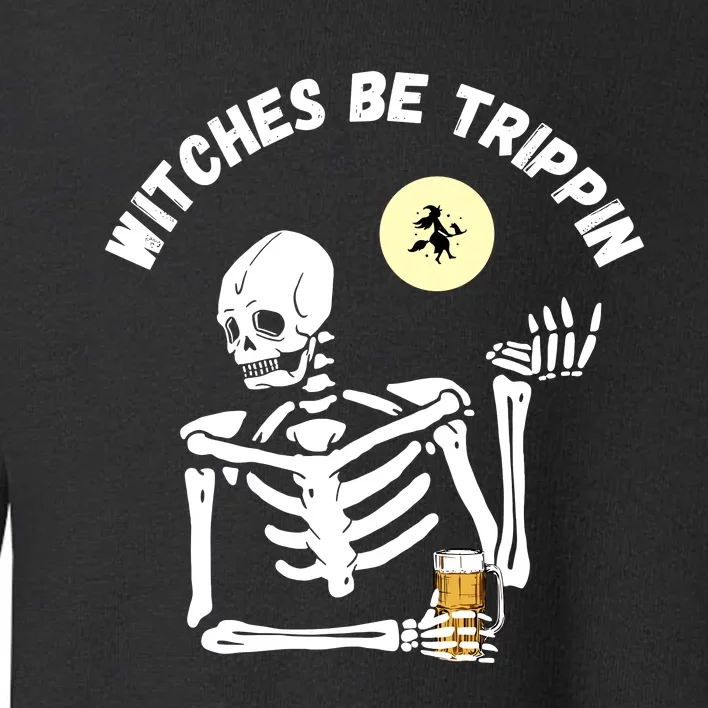 Witches Be Trippin Funny Halloween Skeleton And Witch Pun Toddler Sweatshirt