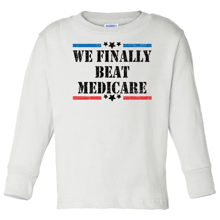 We Finally Beat Medicare Funny Political Toddler Long Sleeve Shirt