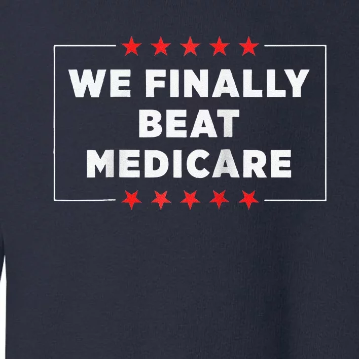 We Finally Beat Medicare Raglan Baseball Toddler Sweatshirt