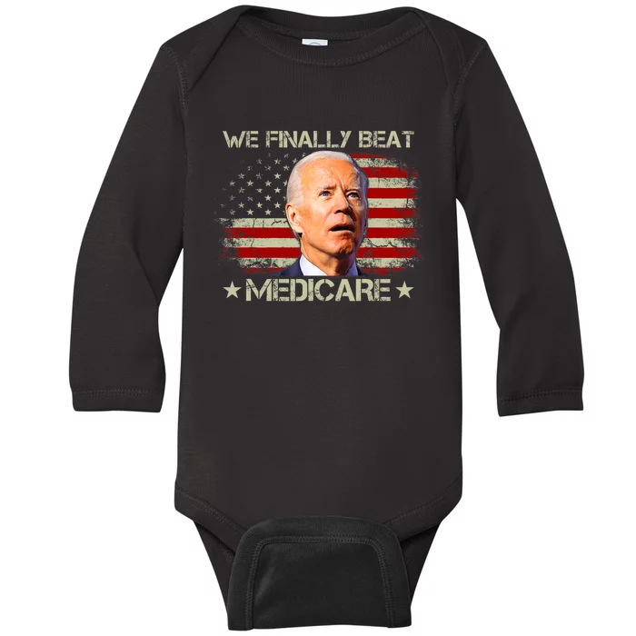 We Finally Beat Medicare Funny Joe Biden Baby Long Sleeve Bodysuit