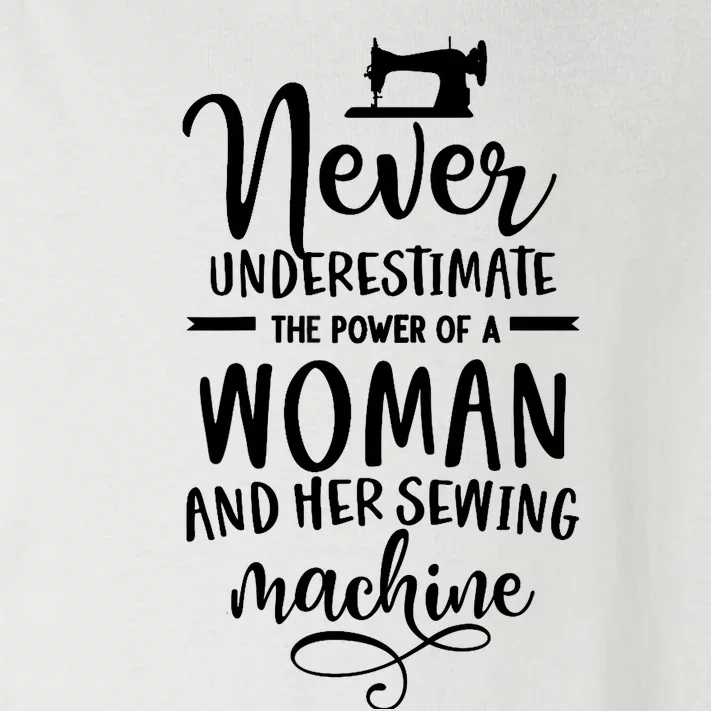 Wo Never underestimate the power of a woman with the sewing machine. Toddler Long Sleeve Shirt